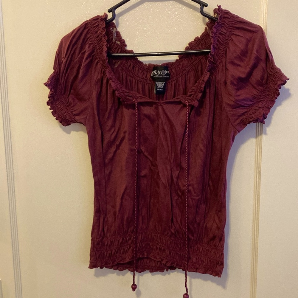 Cute wine colored blouse.